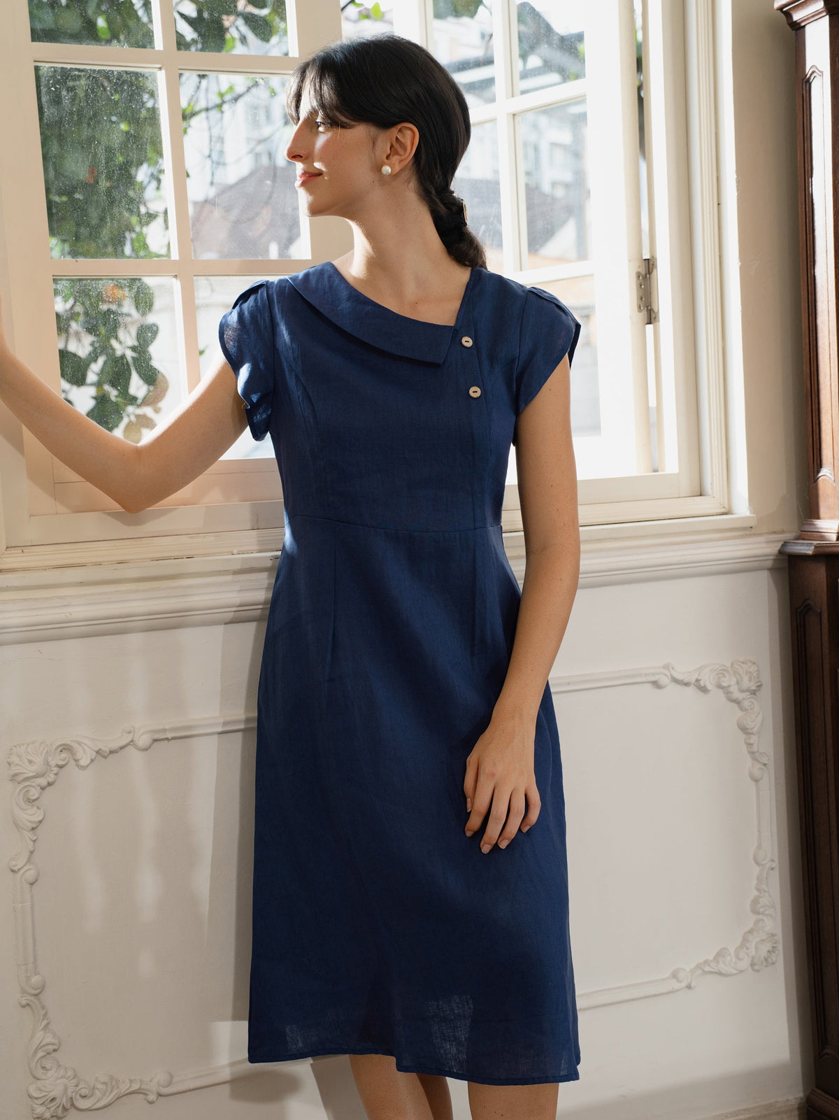 a woman in a blue dress