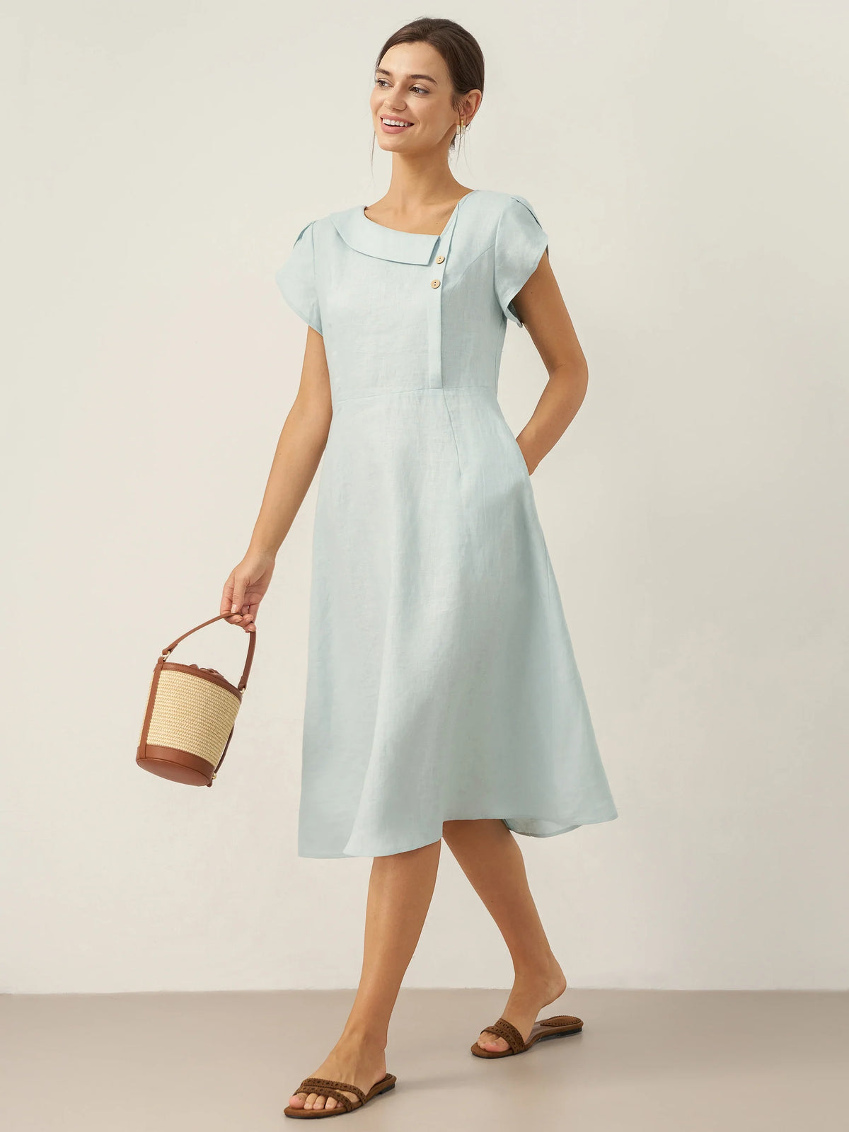 a woman in a light blue dress