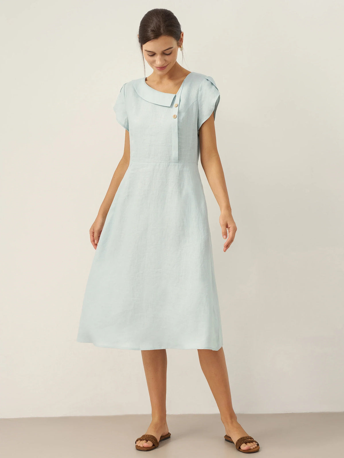 a woman in a light blue dress