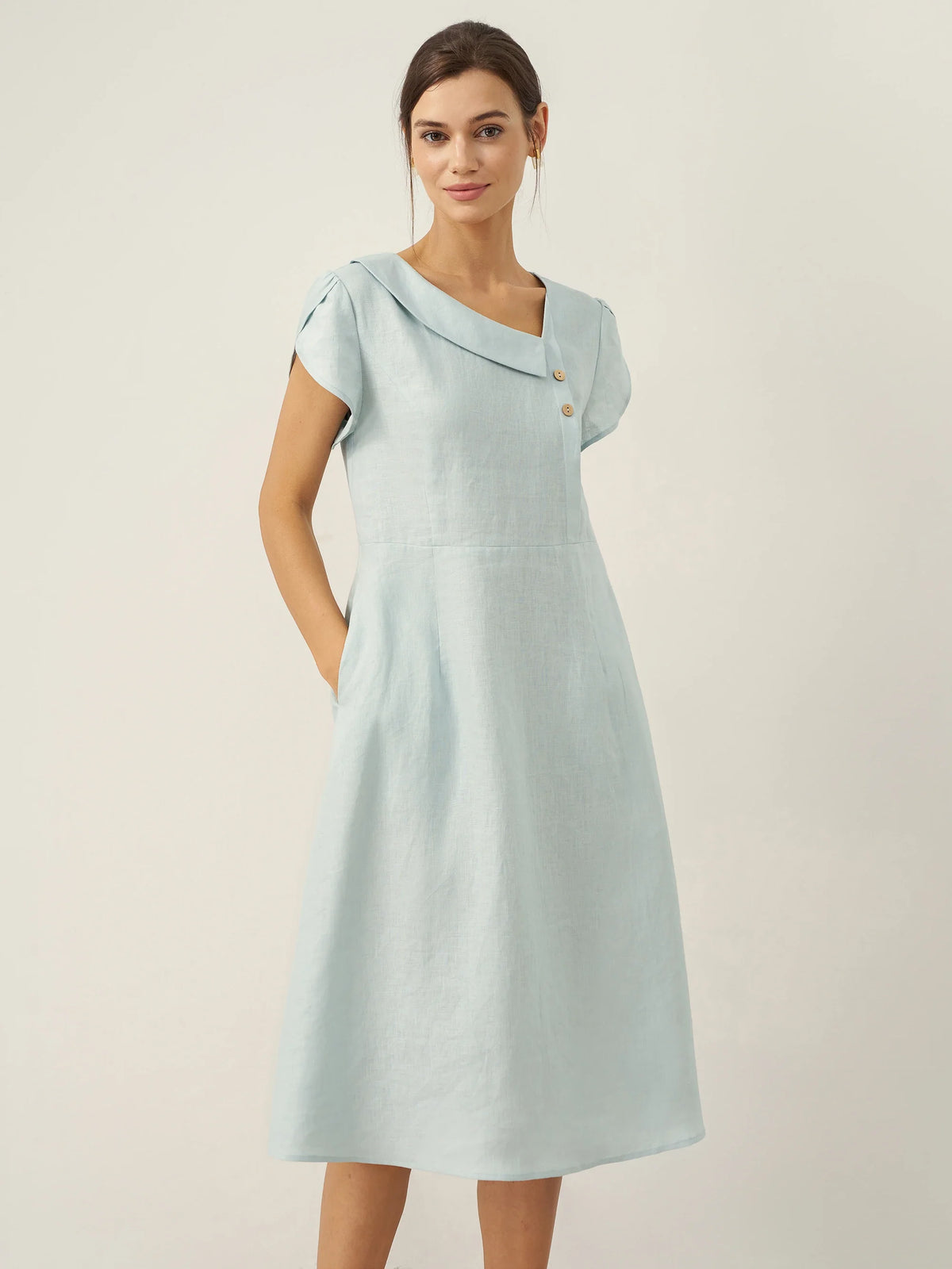 a woman in a light blue dress