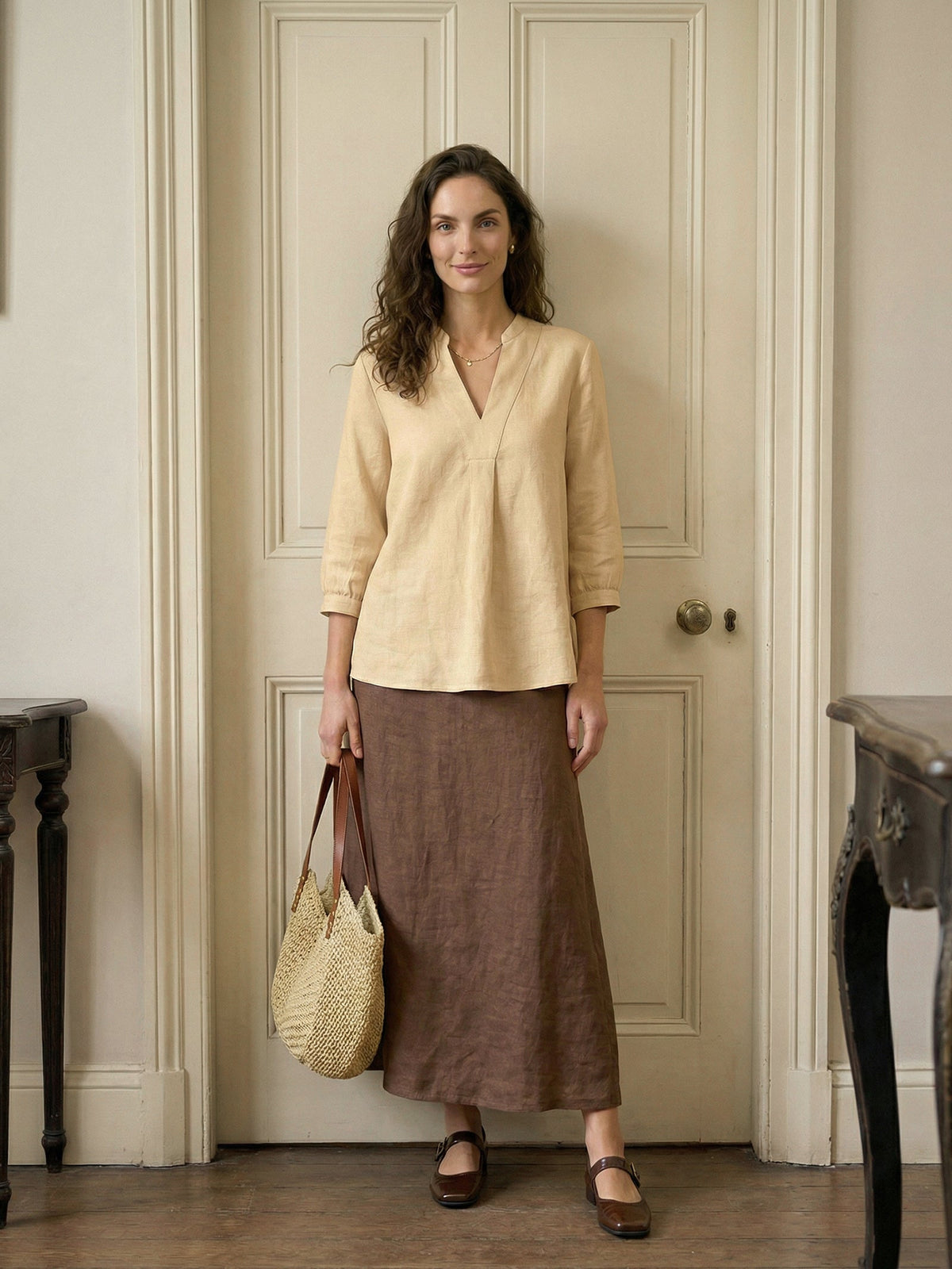a woman standing in front of a door