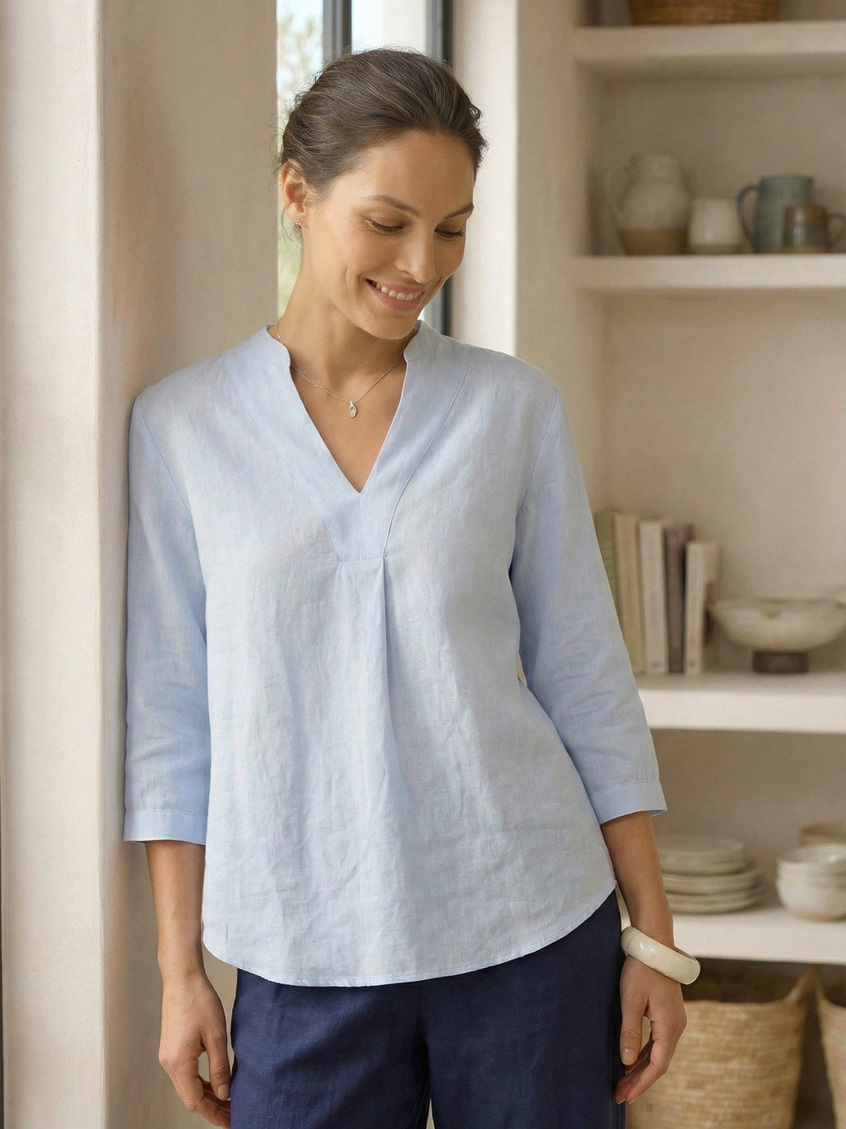a woman in a blue shirt