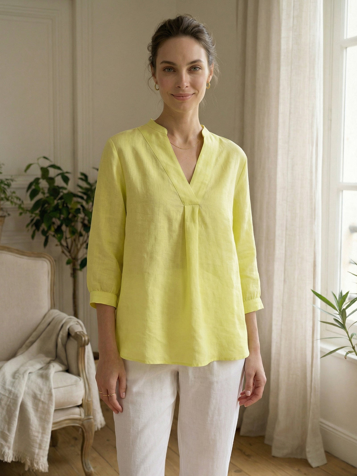a woman in a yellow shirt