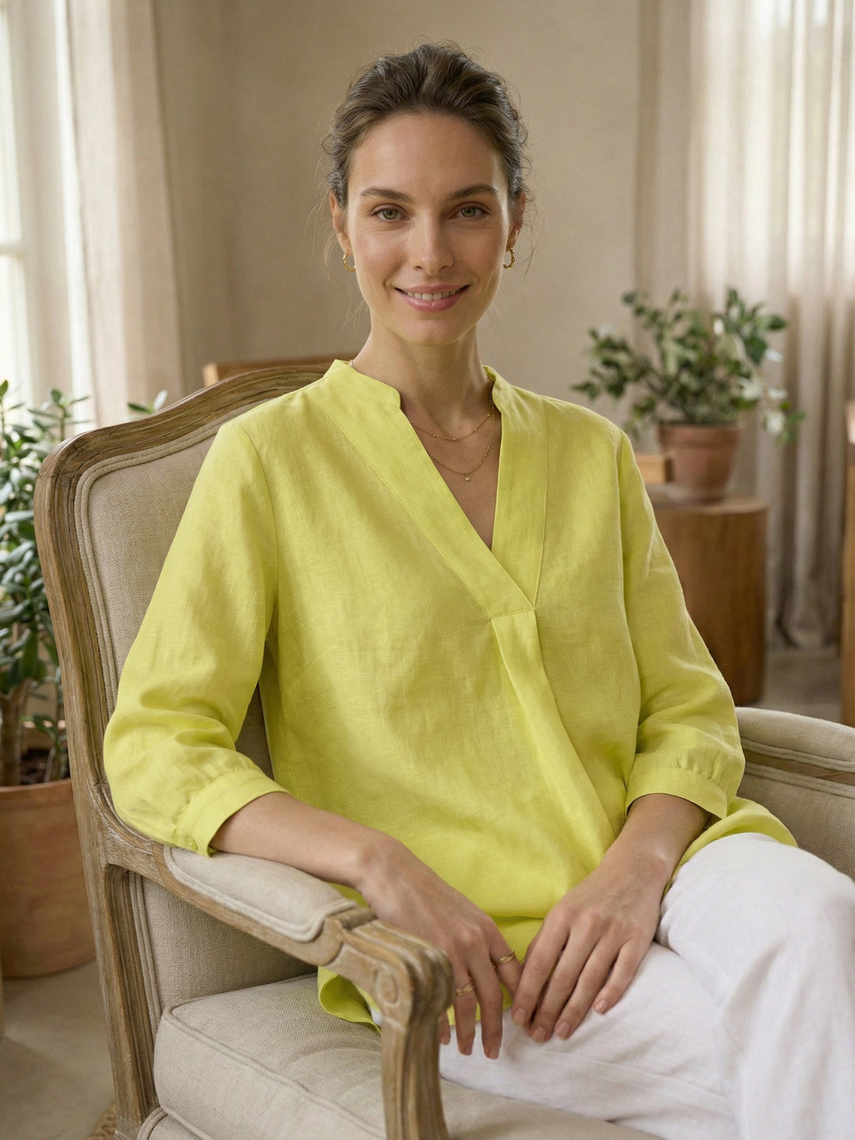 a woman sitting in a chair
