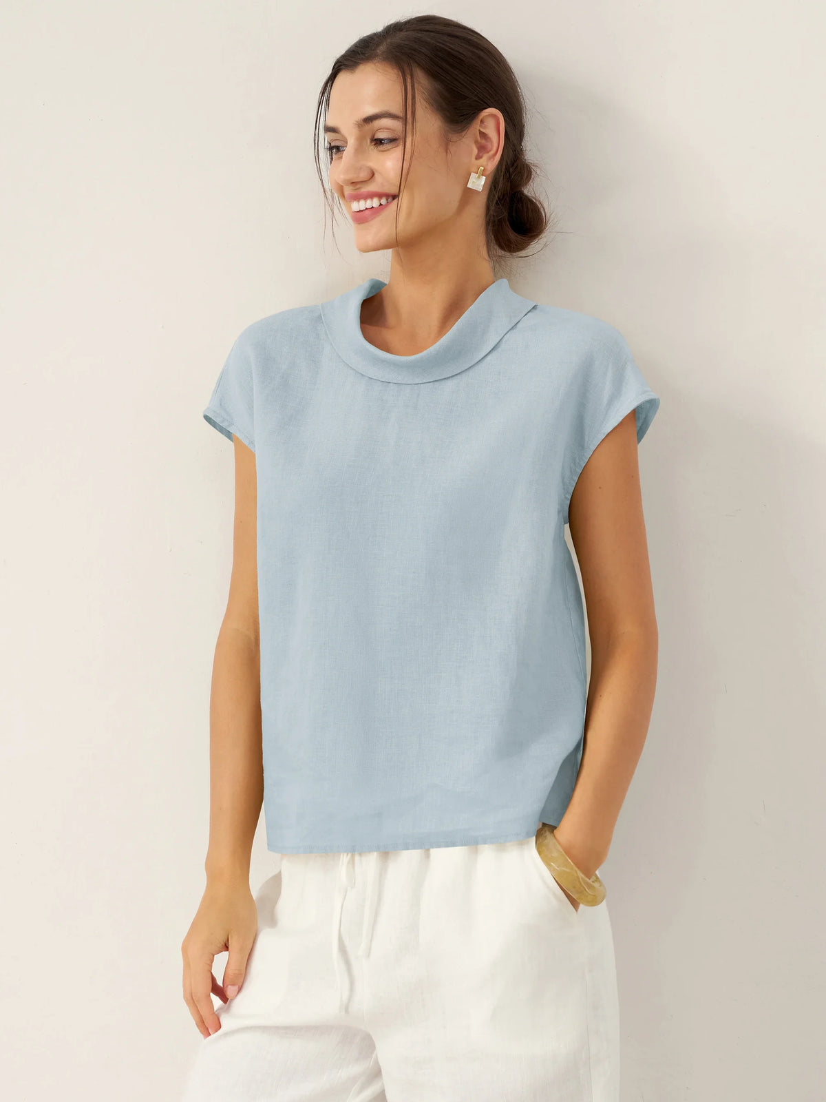 a woman in a blue shirt