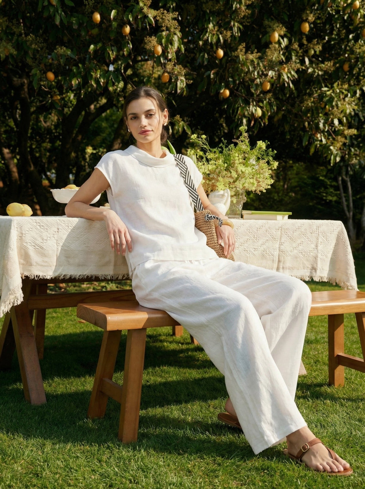 a woman sitting on a bench