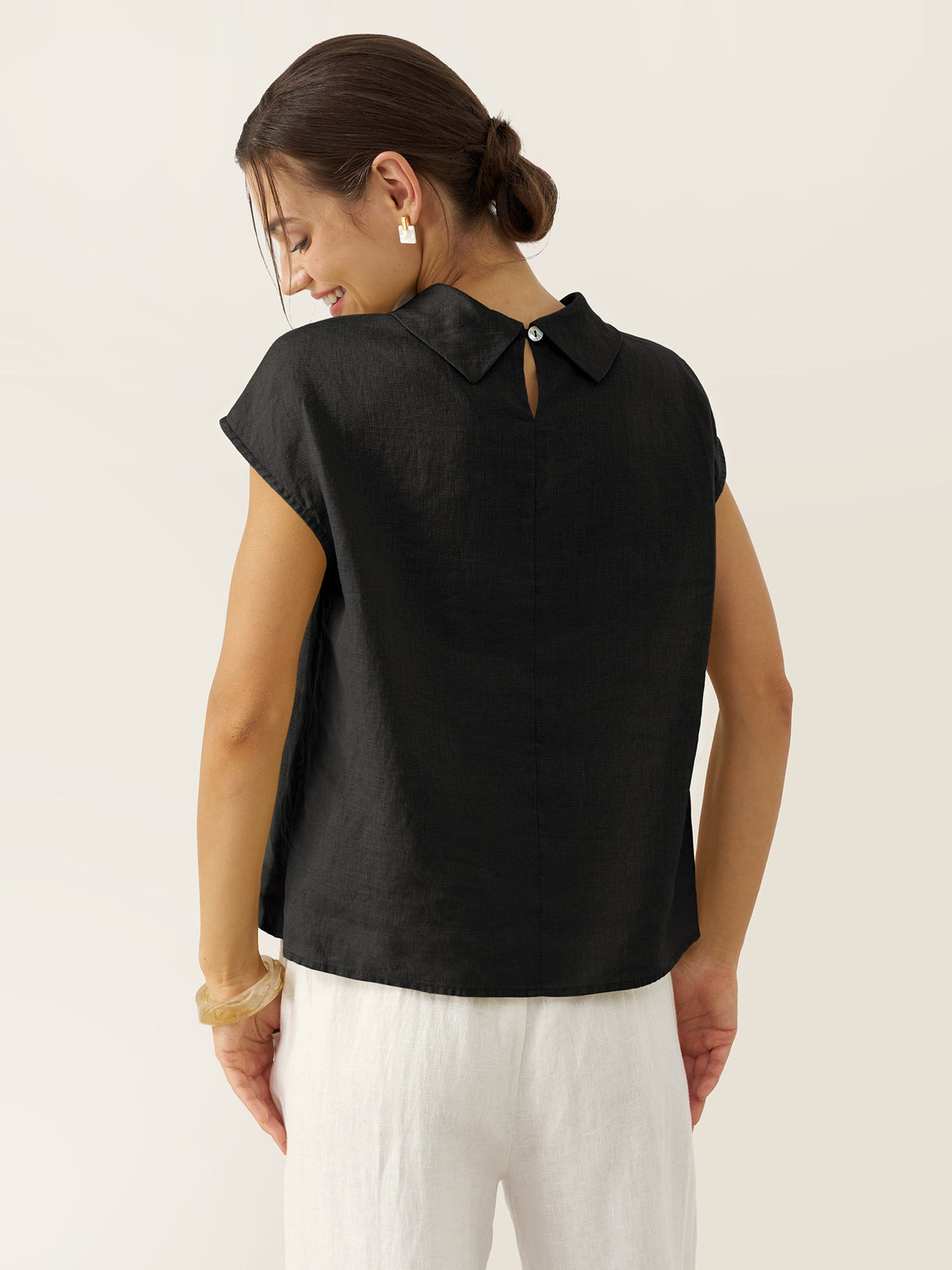 a woman in a black shirt