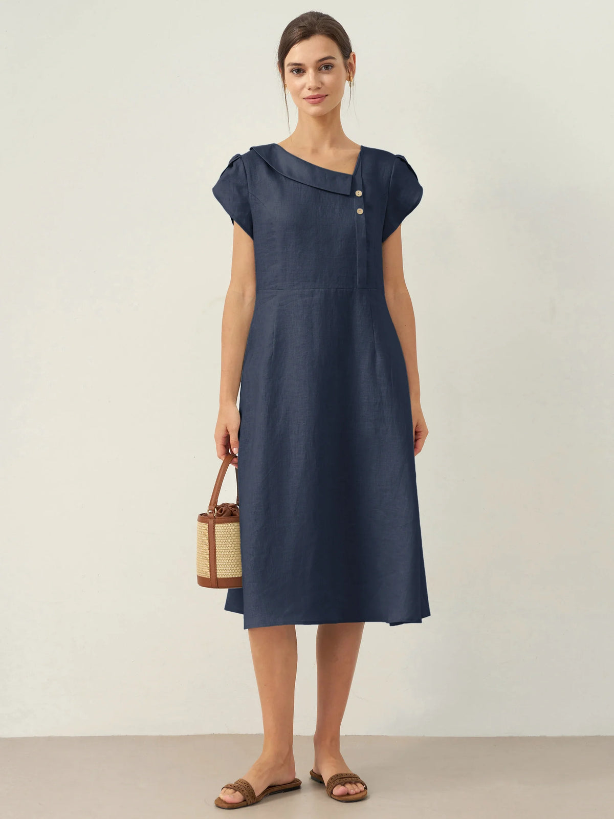 a woman in a blue dress