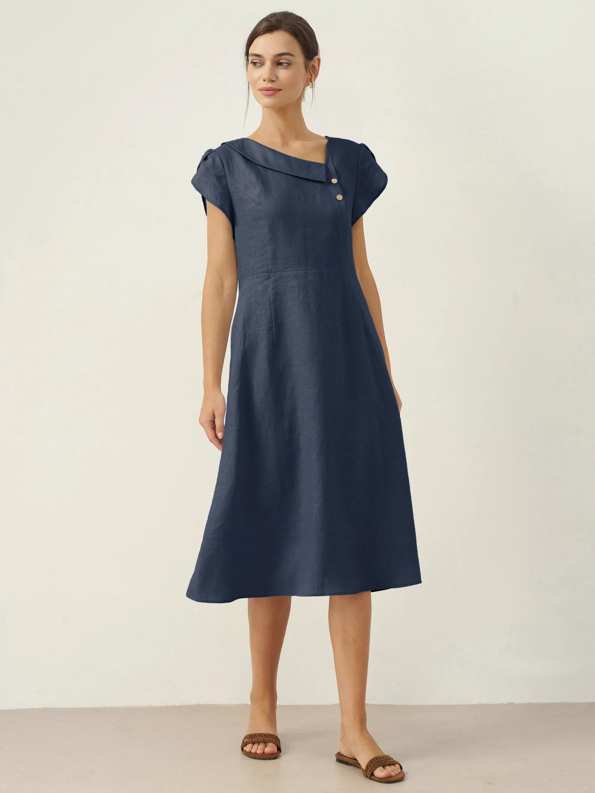 a woman in a blue dress