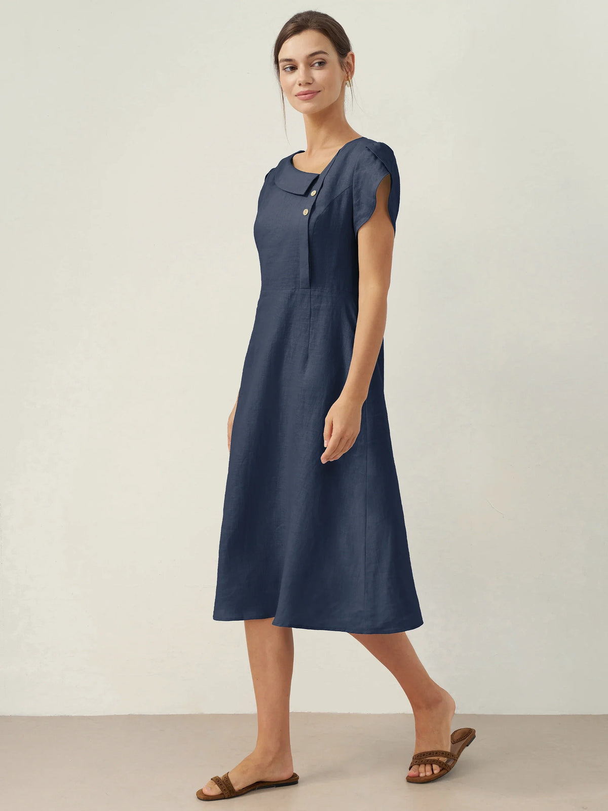 a woman in a blue dress