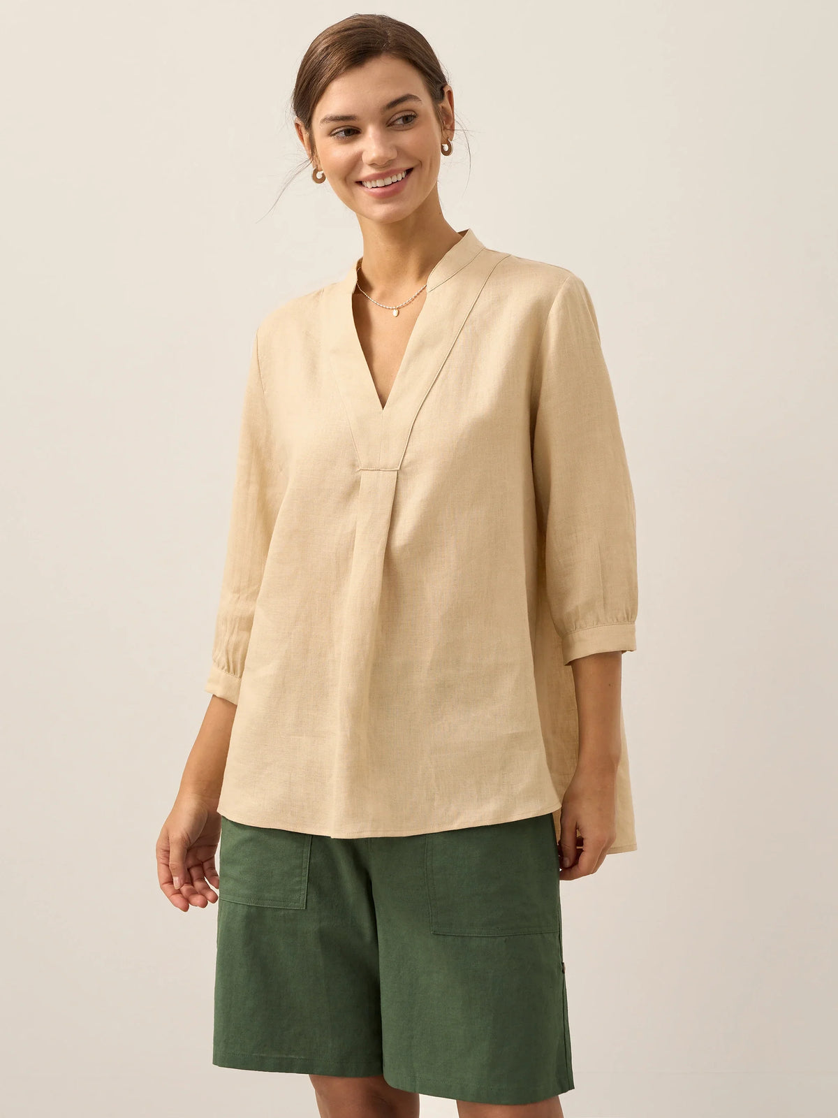 a woman smiling at camera