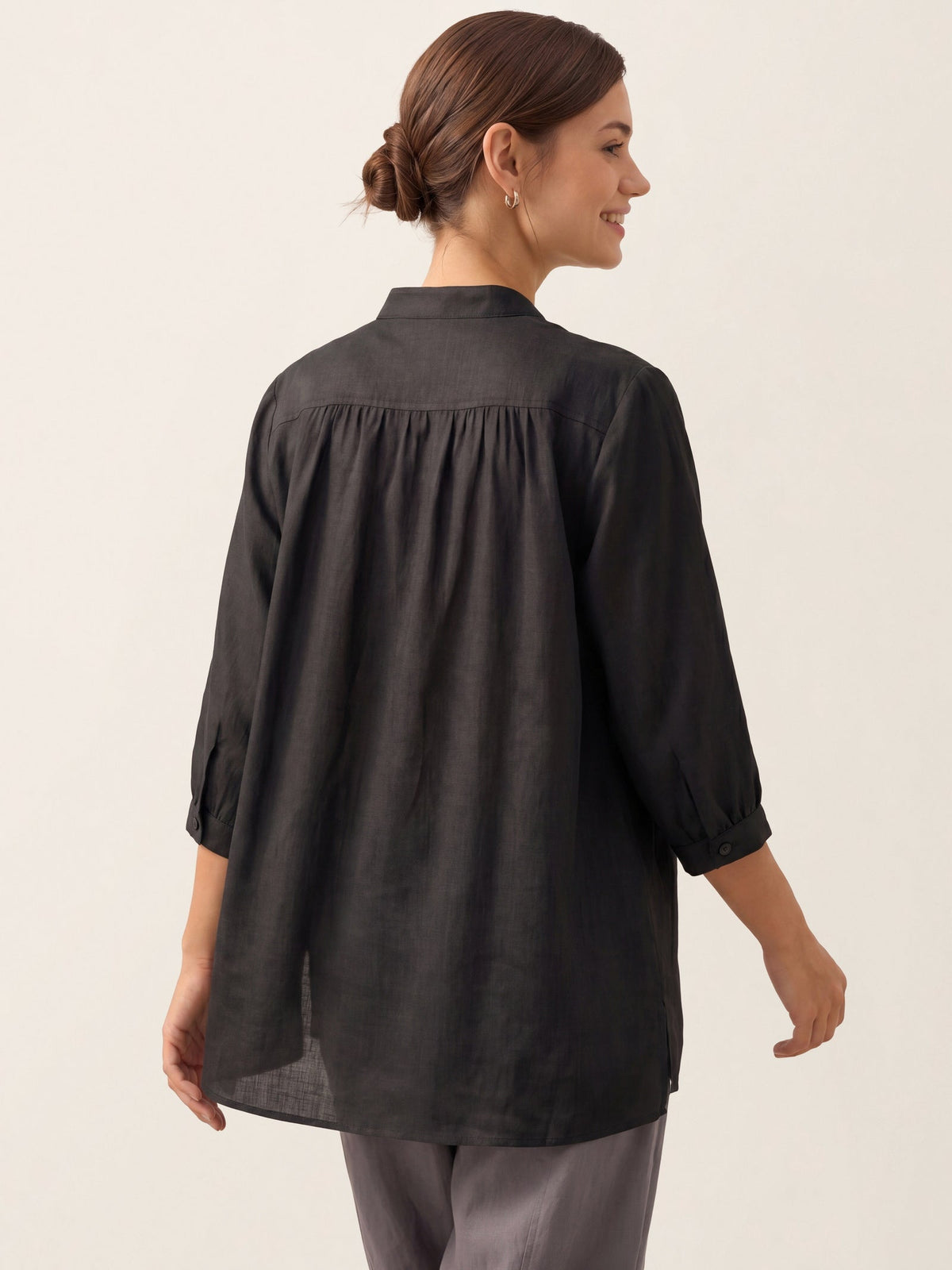 a woman in a black shirt