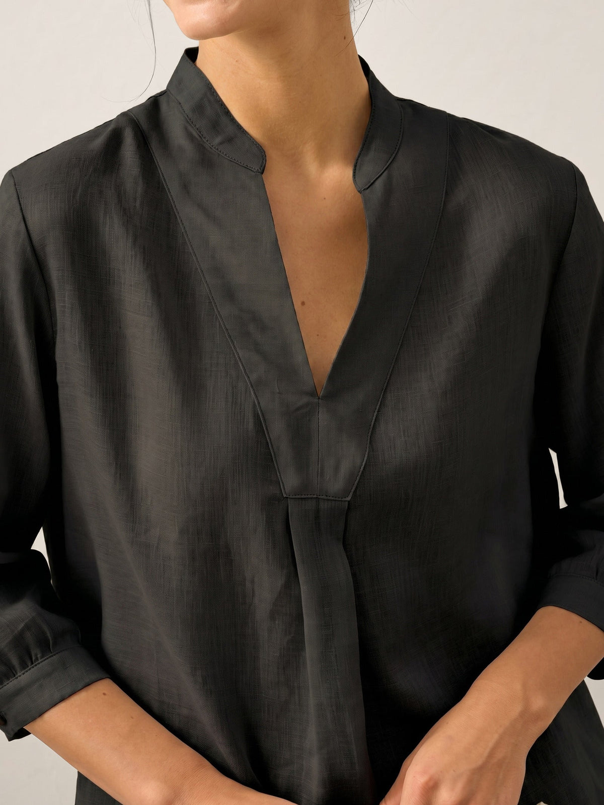 a person wearing a black shirt