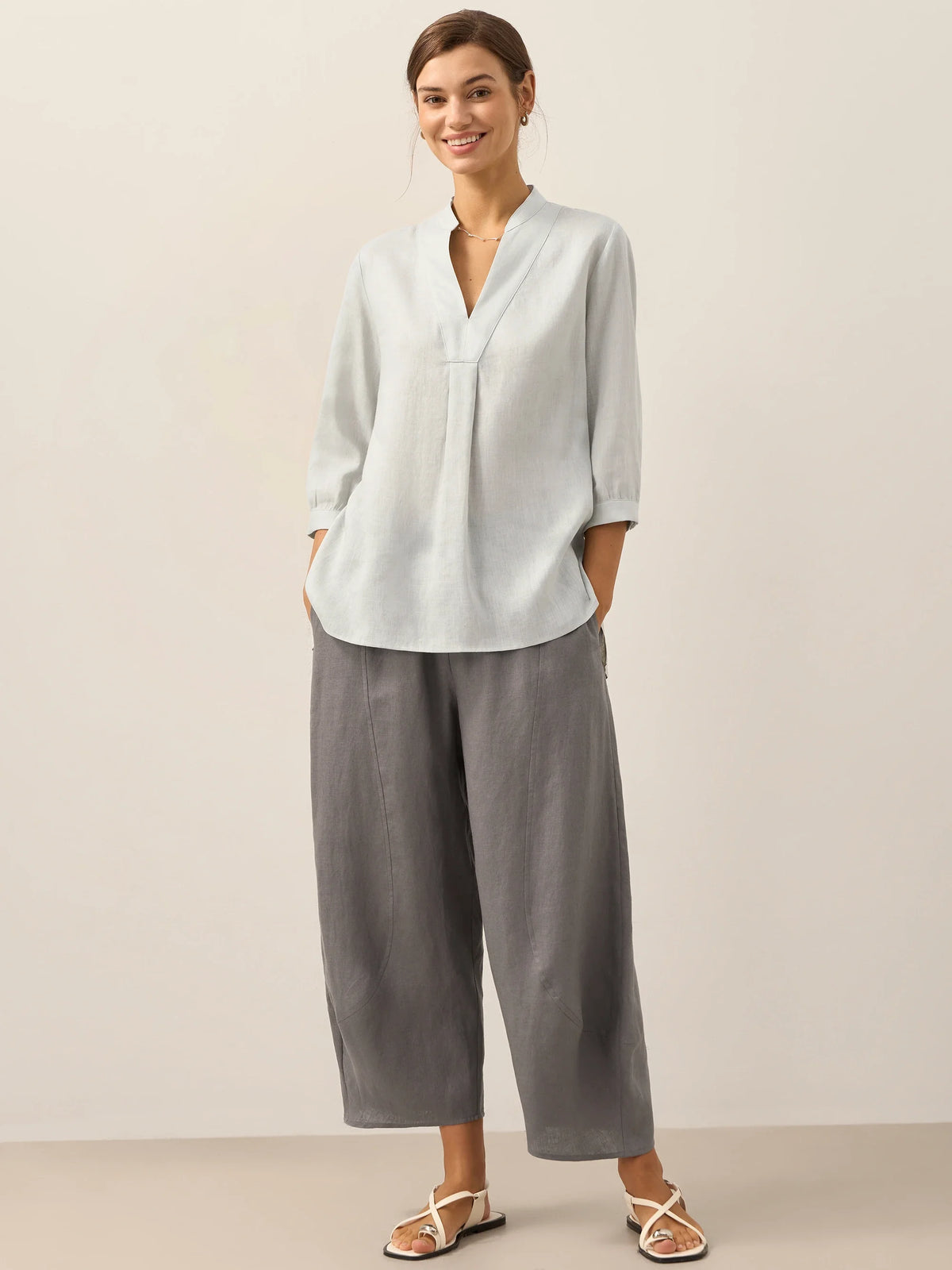 a woman in a white shirt