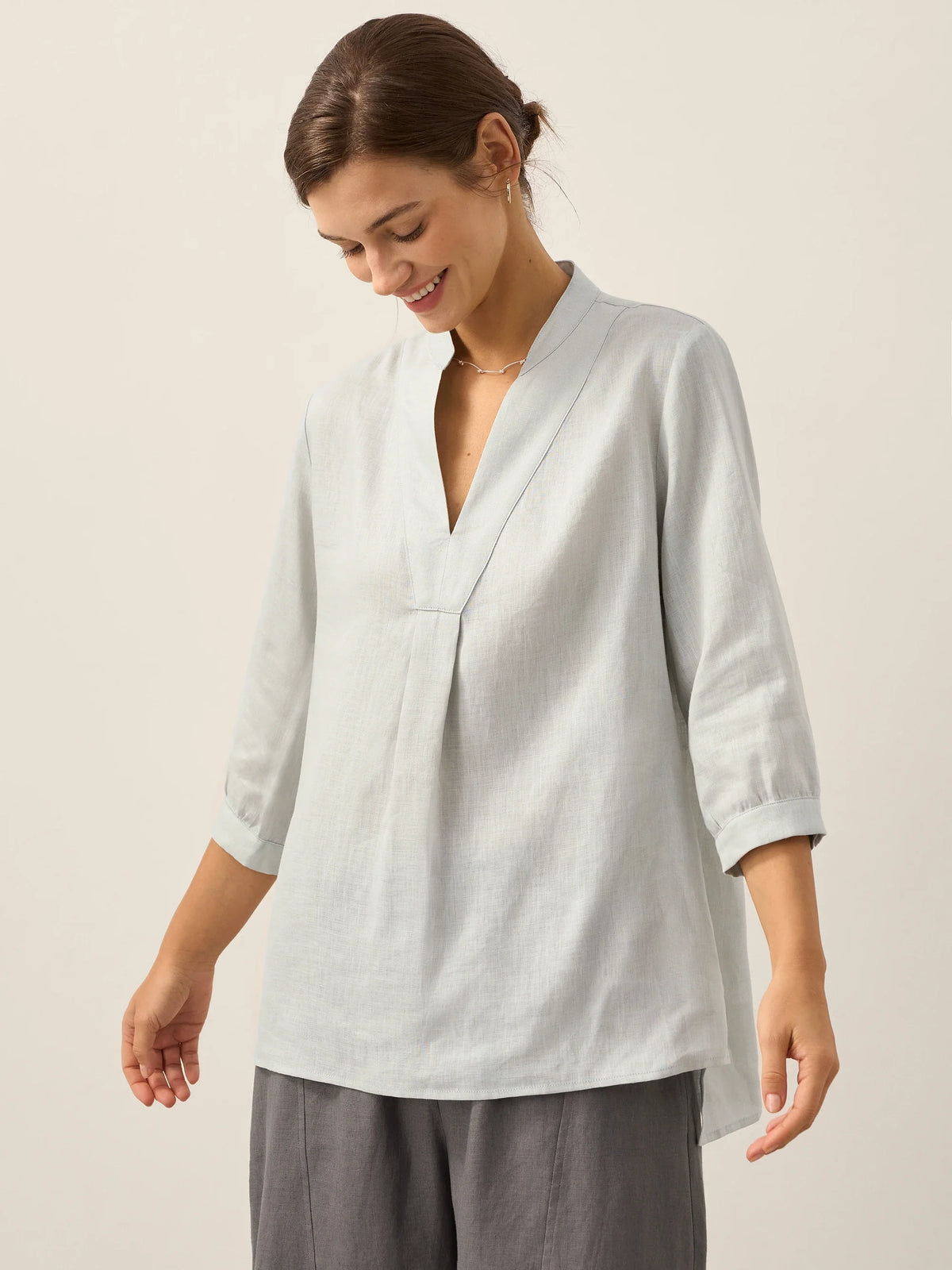 a woman in a white shirt