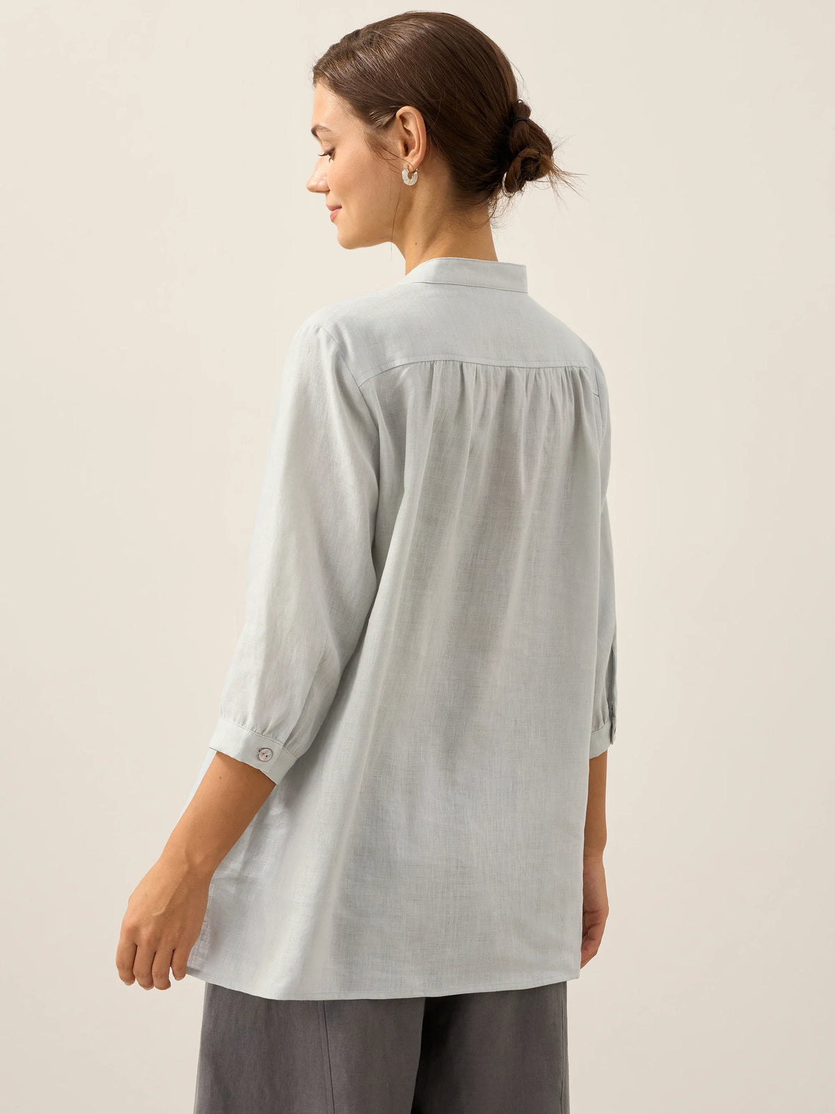 a woman in a white shirt