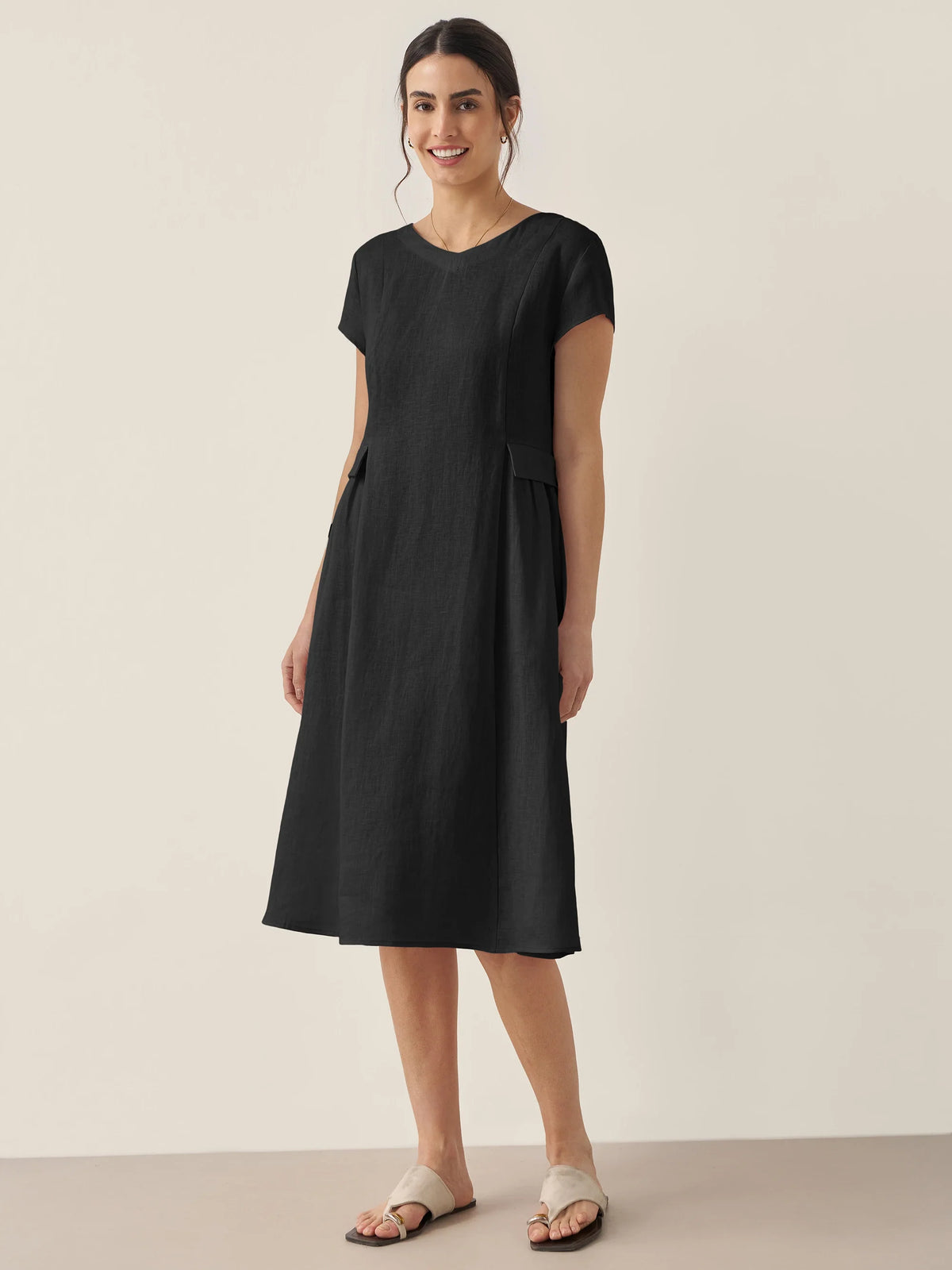 a woman in a black dress