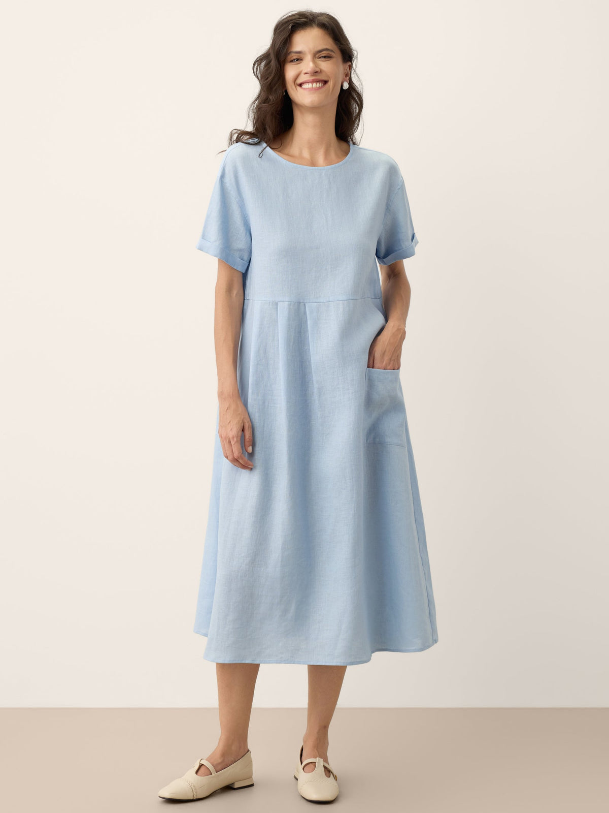 a woman in a blue dress