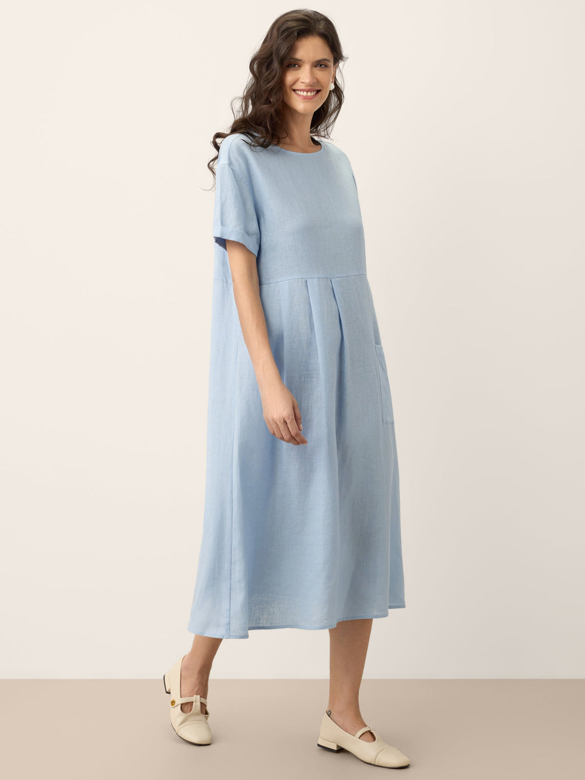 a woman in a blue dress