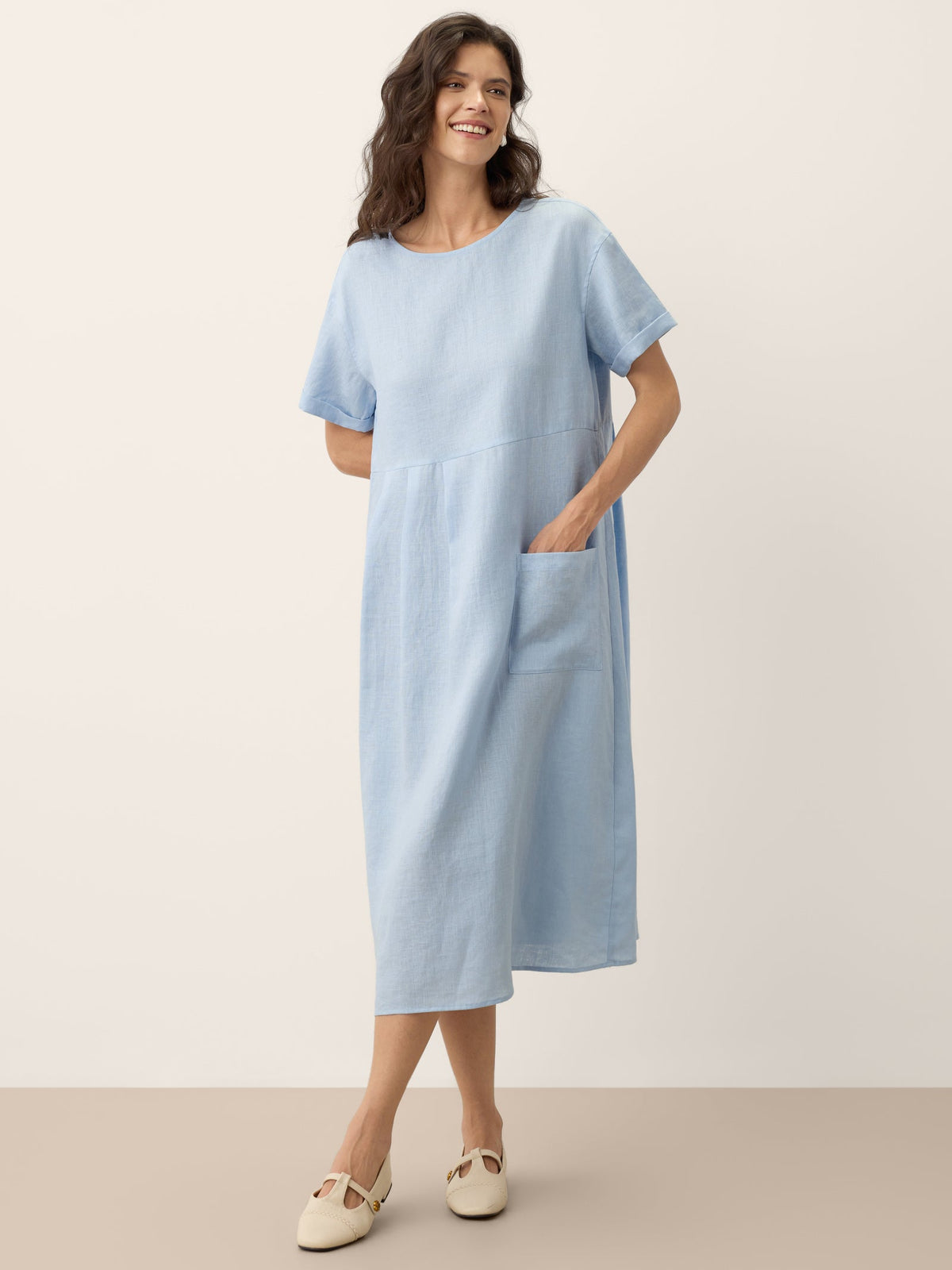 a woman in a blue dress