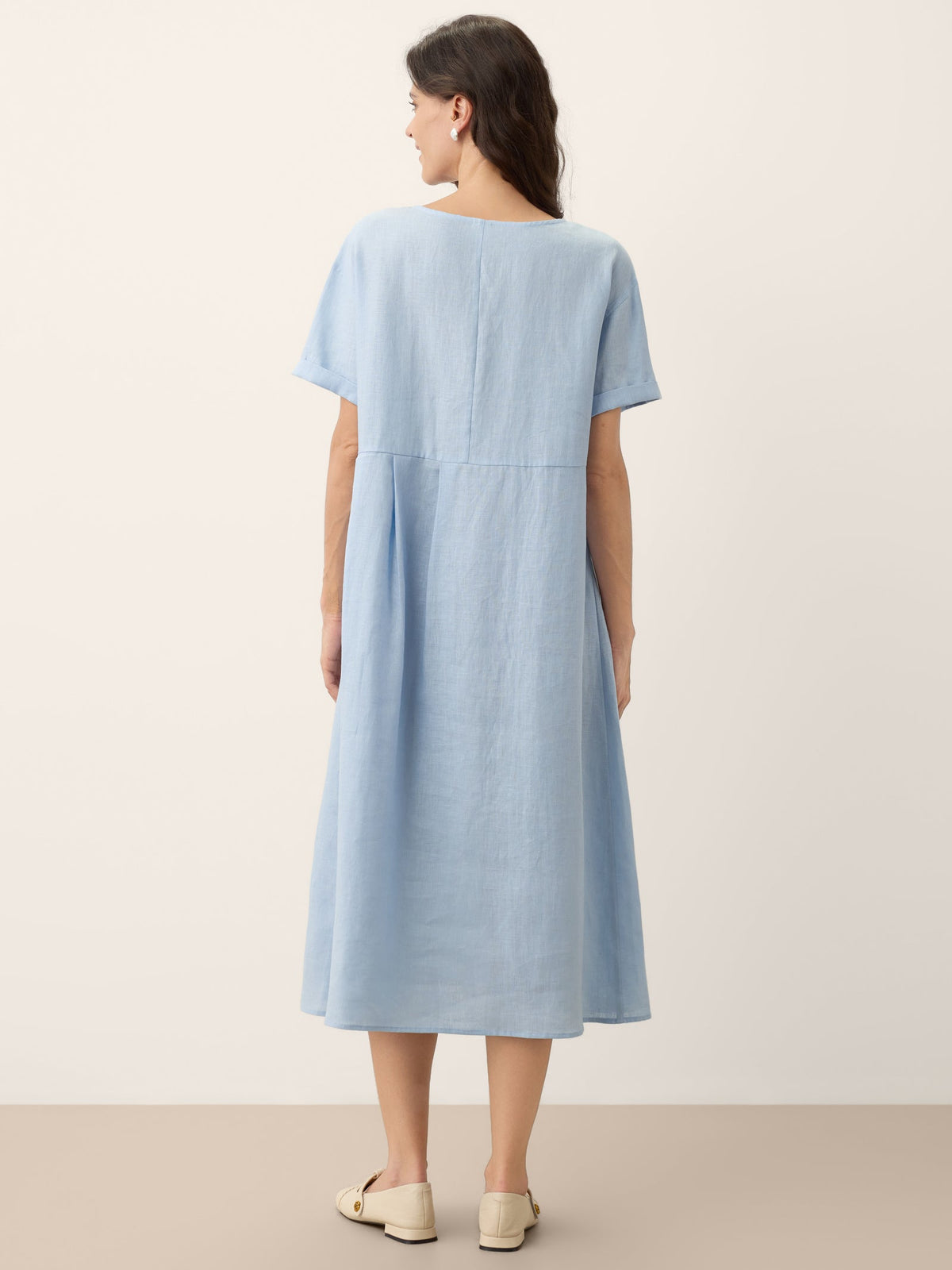 a woman in a blue dress