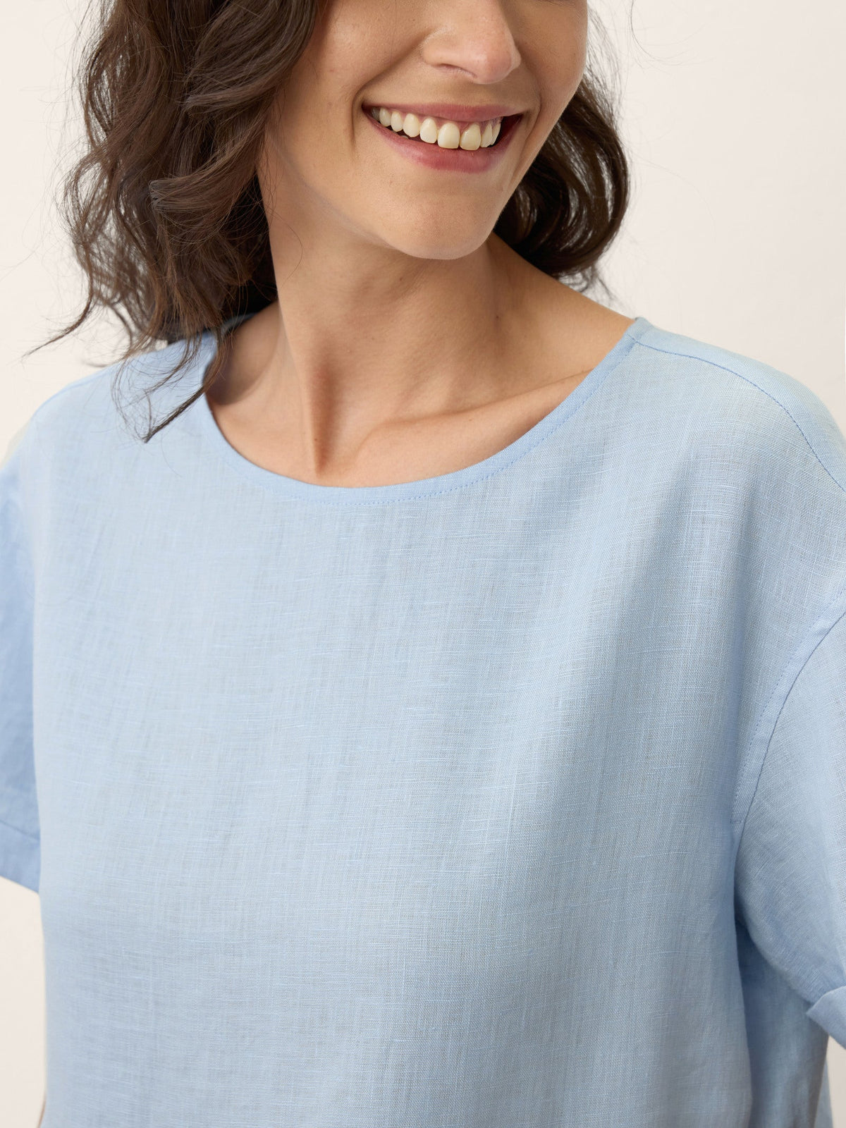 a close-up of a woman smiling