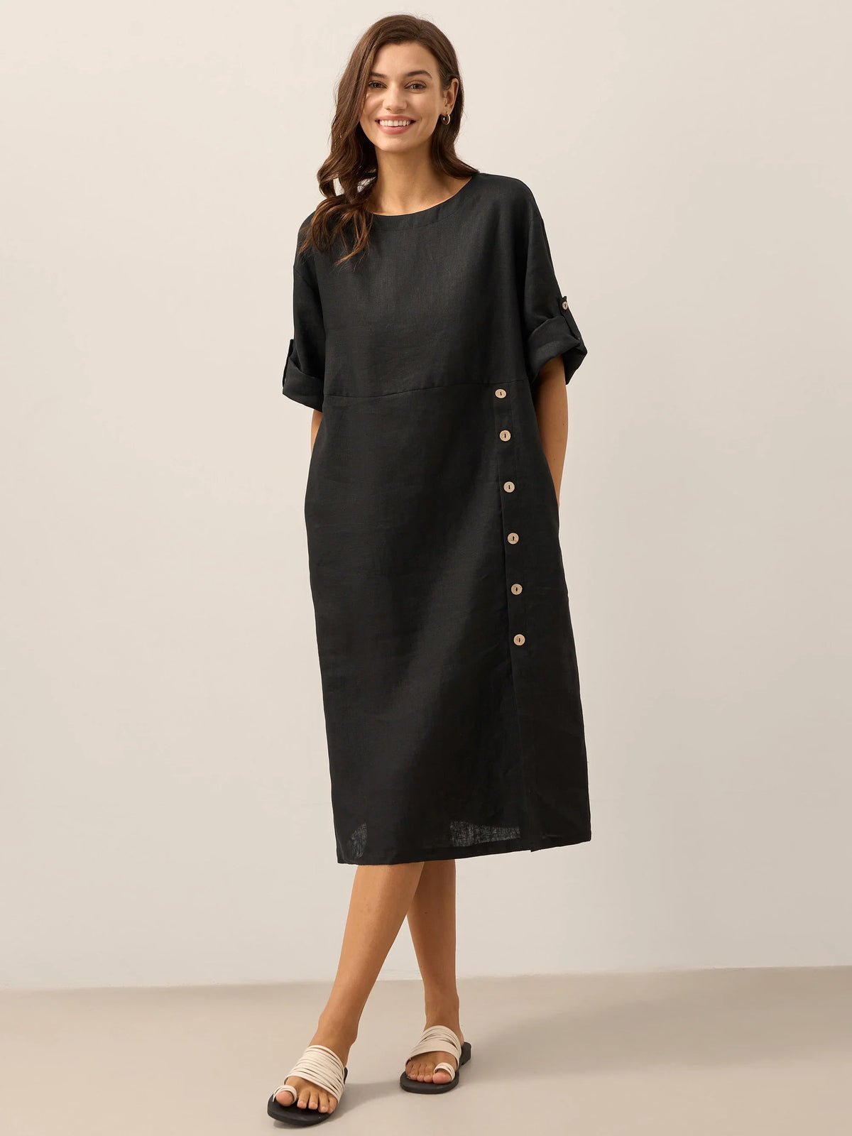 a woman in a black dress