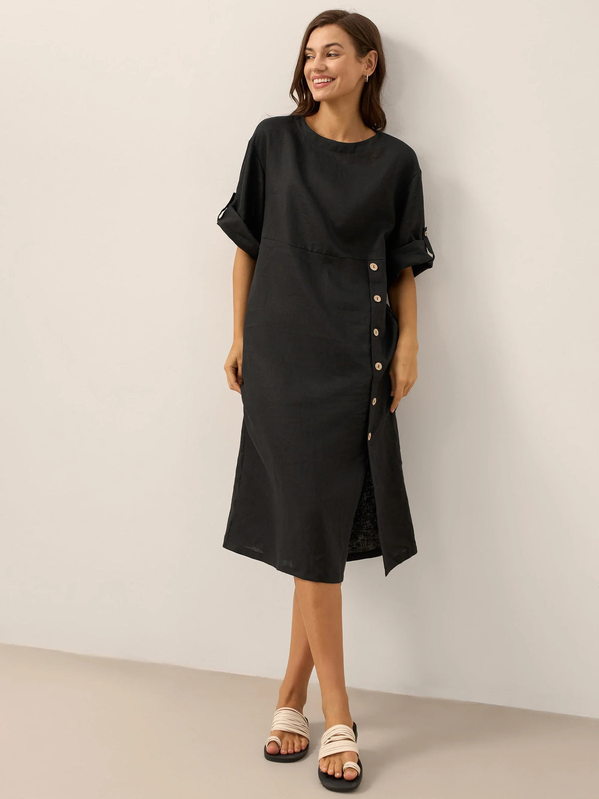 a woman in a black dress