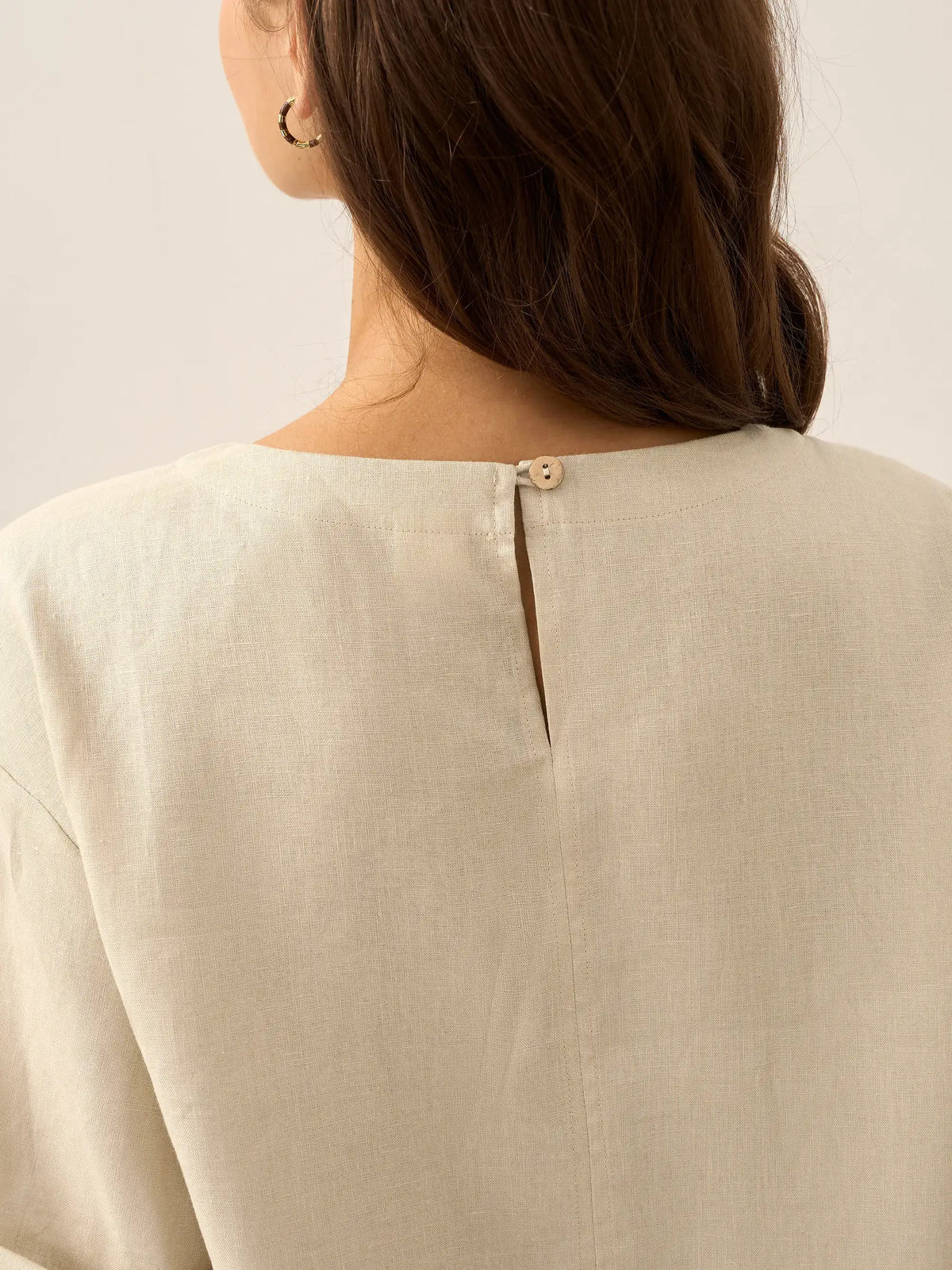 a woman's back with a hole in the back