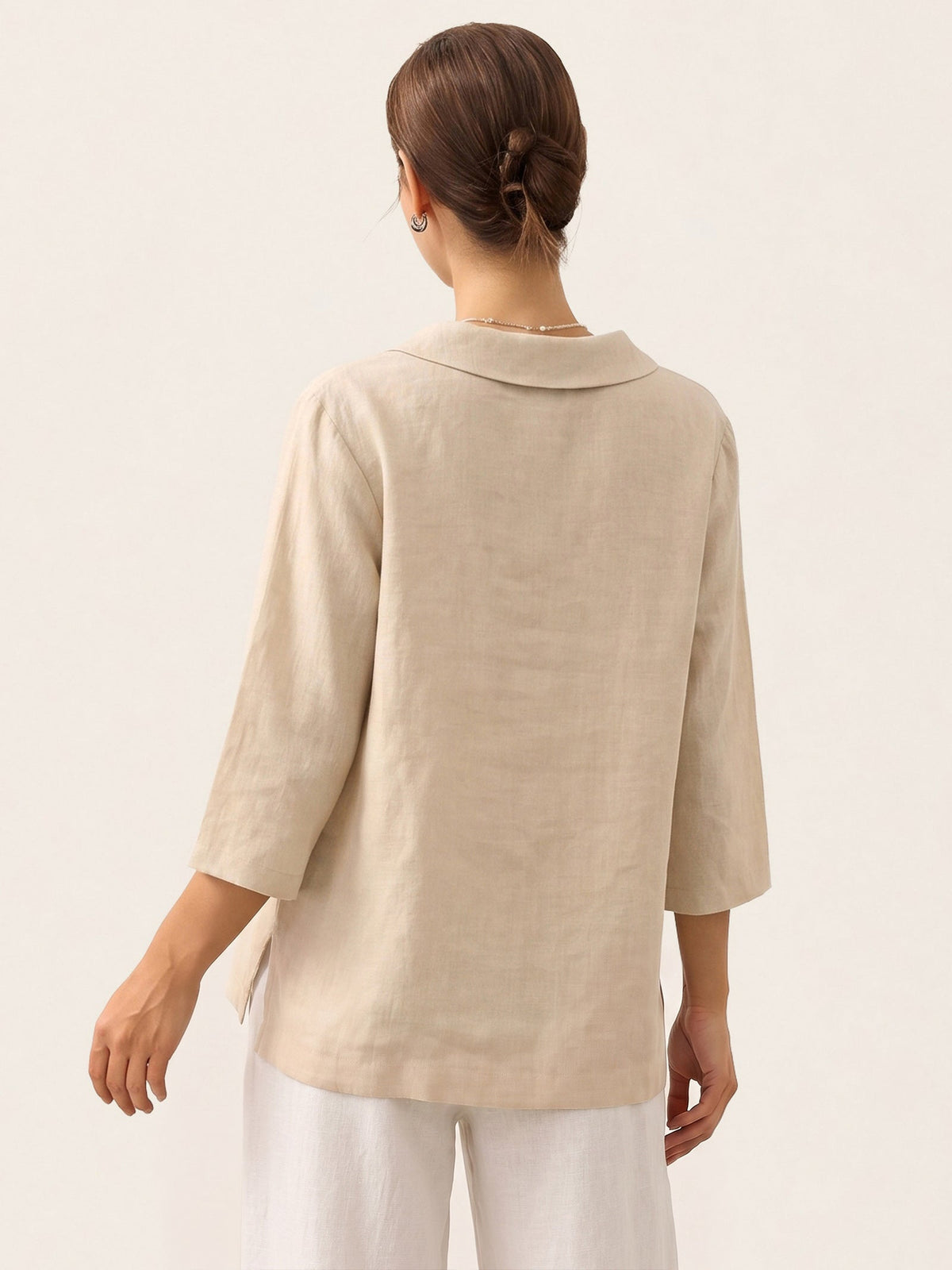 a woman in a white shirt