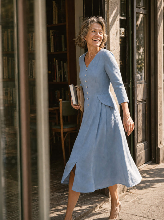 a woman in a blue dress