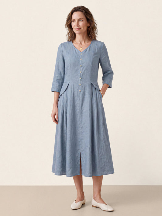 a woman in a blue dress