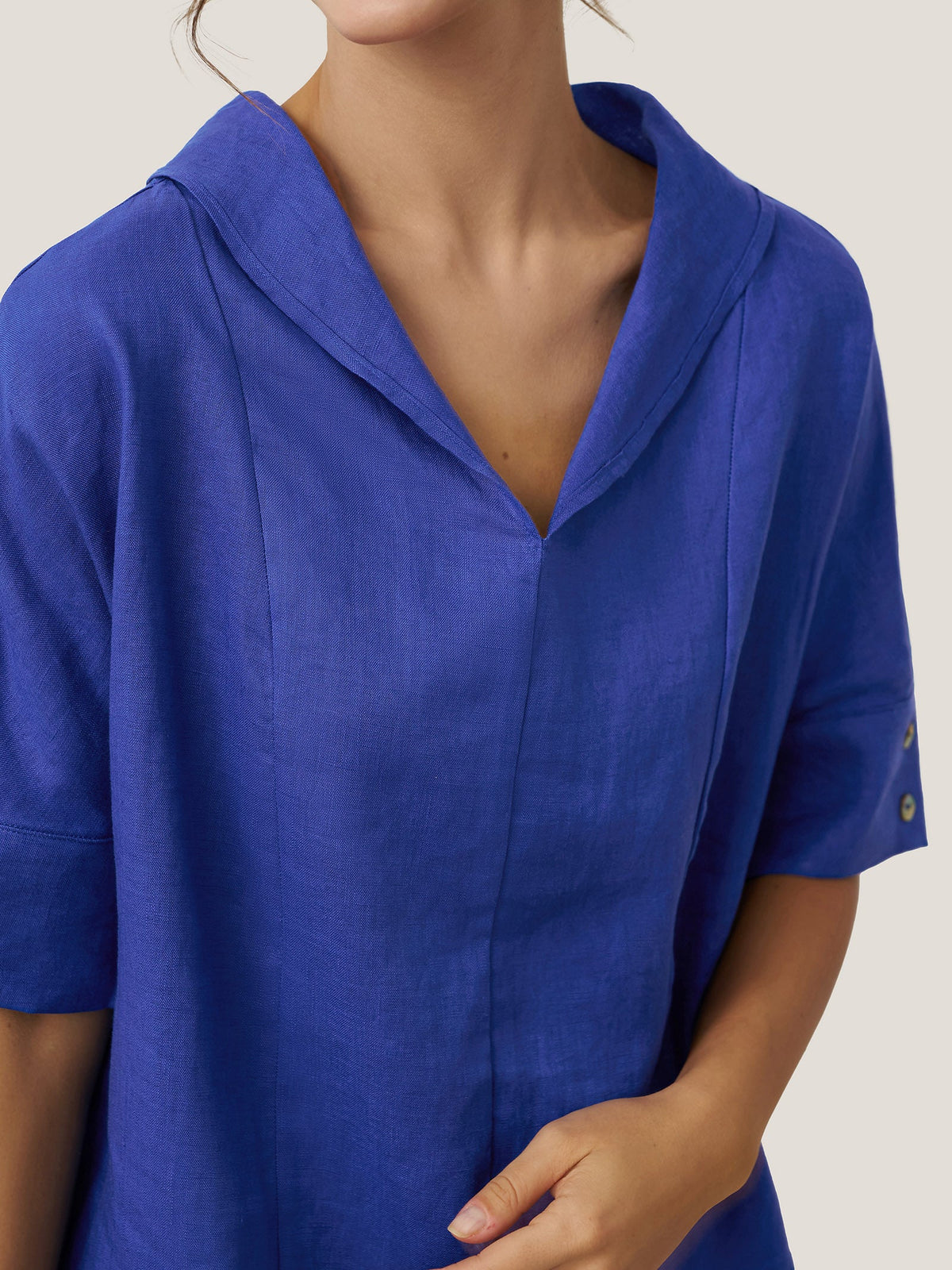 a person wearing a blue shirt