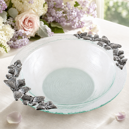 a glass bowl with butterflies on it