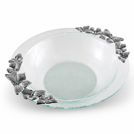a glass bowl with butterflies on it
