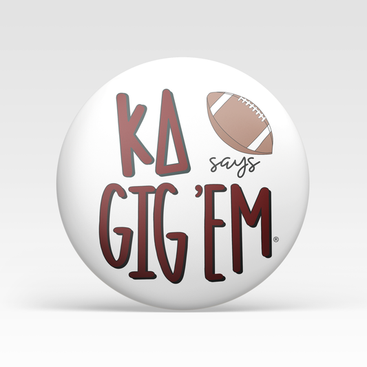 a white ball with red text and a football