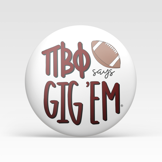 a white ball with red text and a football