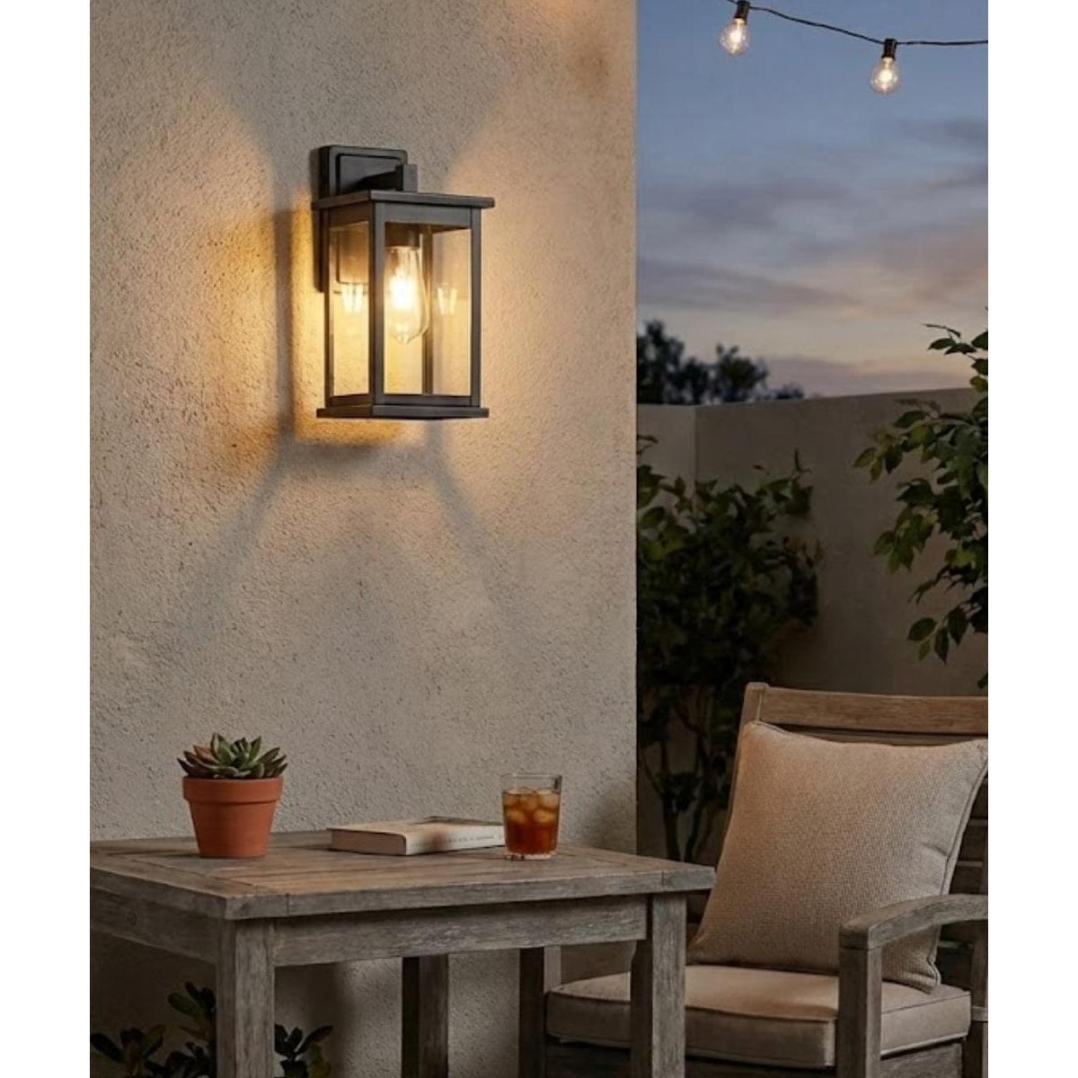 11"H Bowton II Outdoor Wall Light - Dusk to Dawn Matte Black Finish with Glass Shade by Millennium Lighting