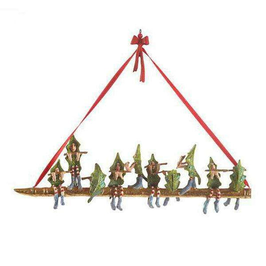 a group of gnomes on a wooden bridge