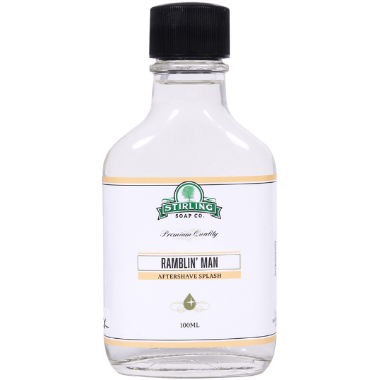 a bottle of liquid with a white label