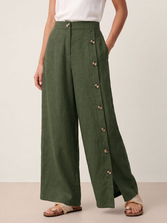 a woman wearing a green pants
