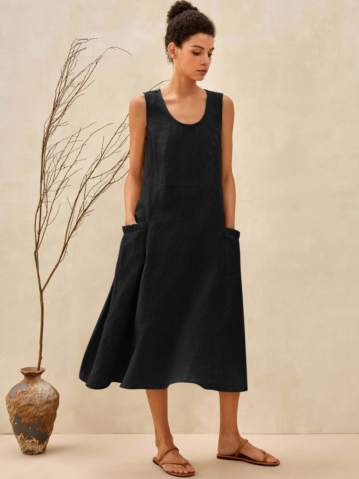 a woman in a black dress