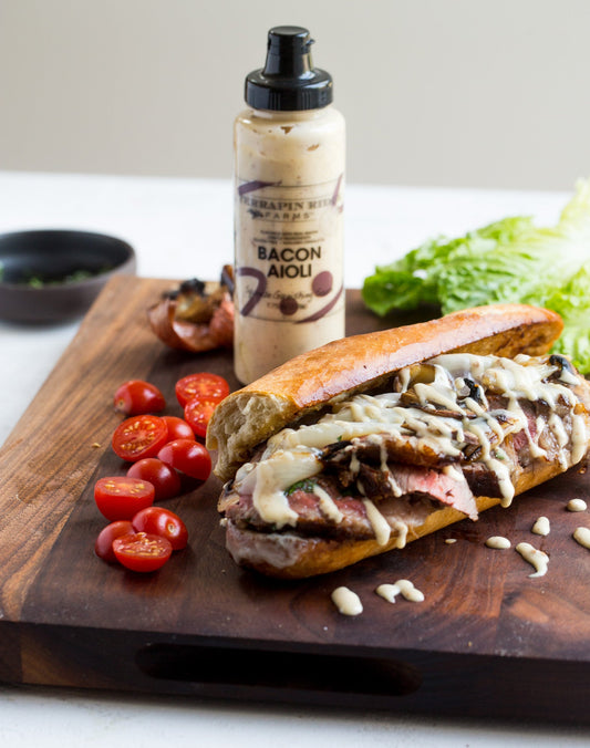 a sandwich on a wooden board