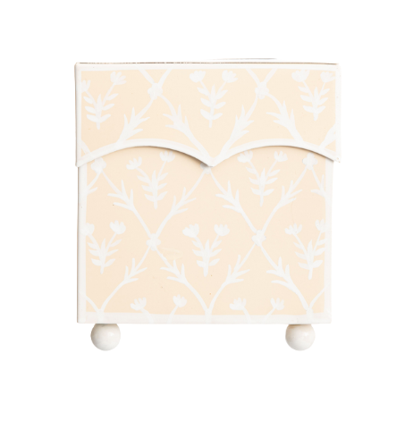 a white box with a floral design