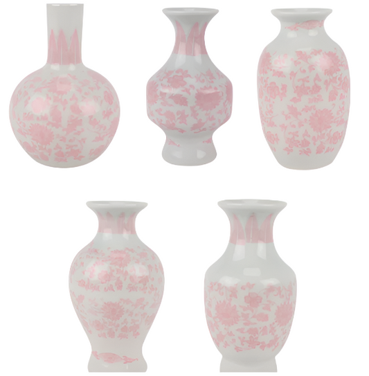 a group of vases with pink designs