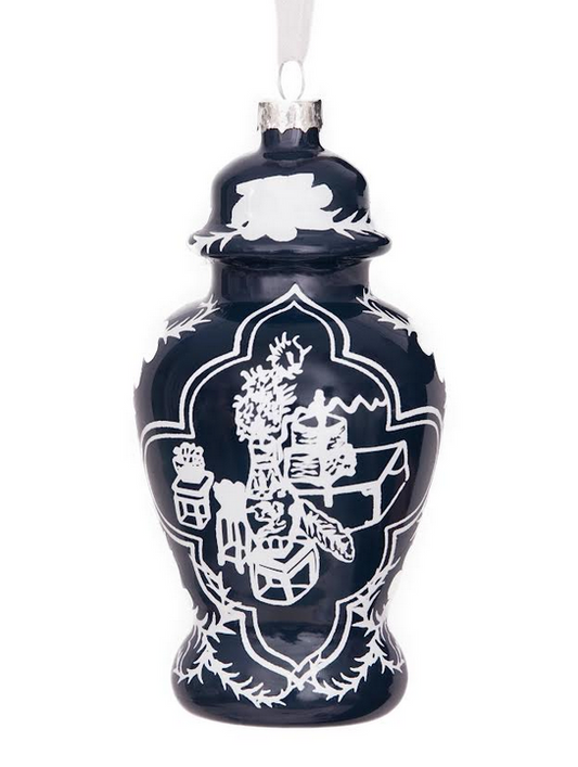a blue and white ceramic vase