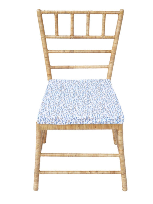 a chair with a blue and white cushion