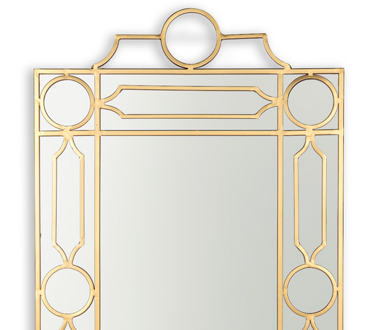 a mirror with gold trim