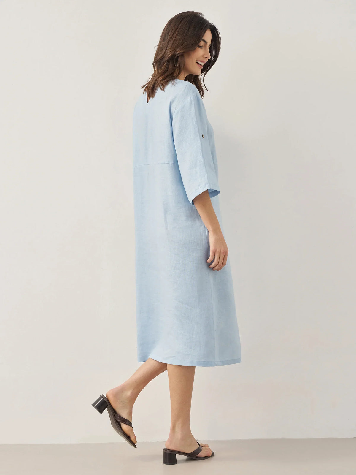 a woman in a blue dress