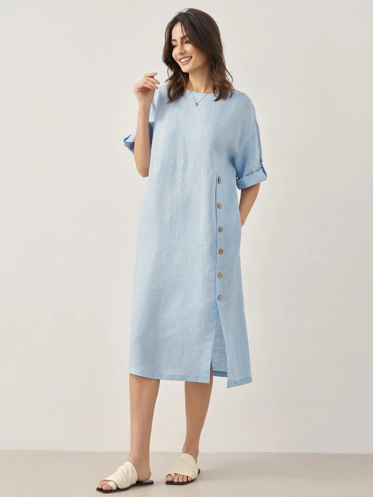 a woman in a light blue dress